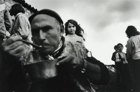 Letizia Battaglia — The little girl follows me with the eyes