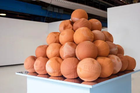 Joseph Hughes — A Mimicry to Memory, 55 terracotta Supreme x Spalding Basketballs